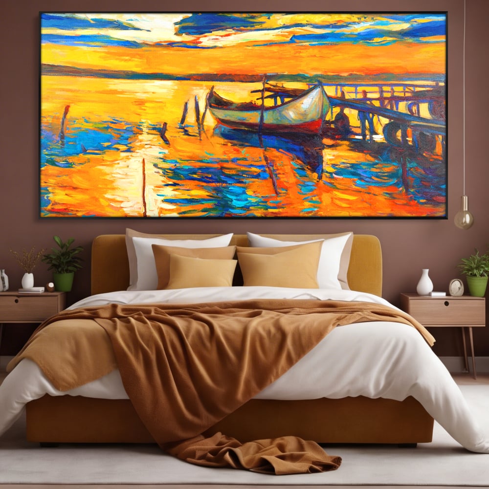 Tablou canvas cu pictura cu barca la apus, in rama de aluminiu negru, pe perete intr-un dormitor